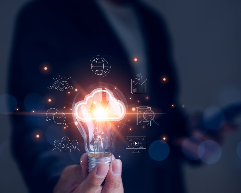 Businessman hand holding creative light bulb with icons global Internet connection on plan strategy, big data, Business connection application technology and digital marketing, Financial and banking,
